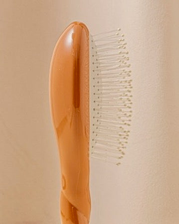 N.04 La Petite Brosse Démêlante & Massante La Miracle Terracotta
